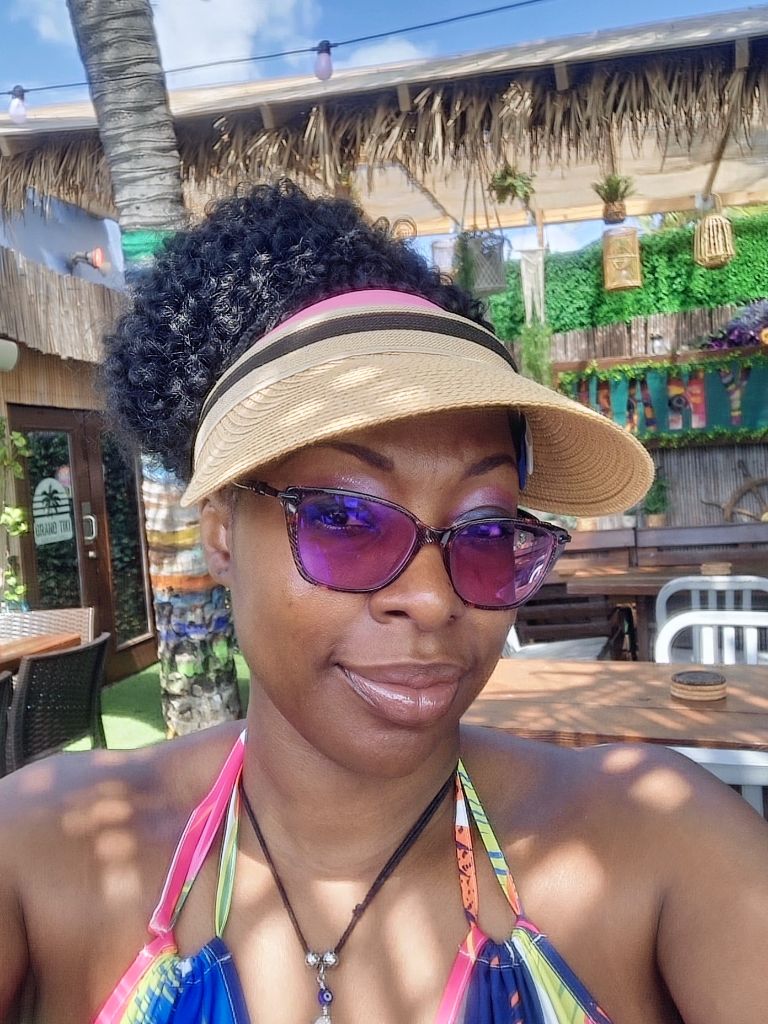 Kaotic Thoughts creator - portrait with visor and purple glasses